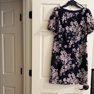 beautiful size 10 dress for a wedding brand new. gold in the flower design